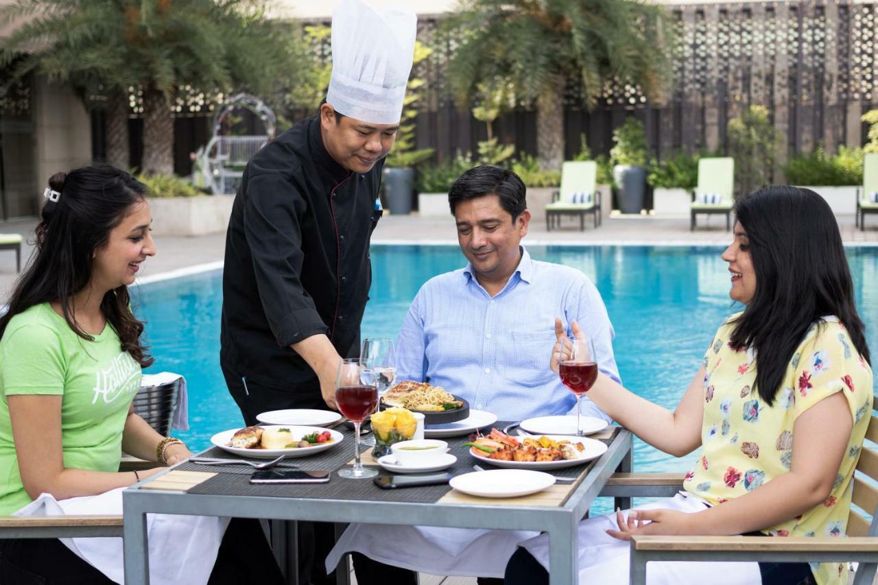 Golden Tulip Suites Gurgaon Buitenkant foto